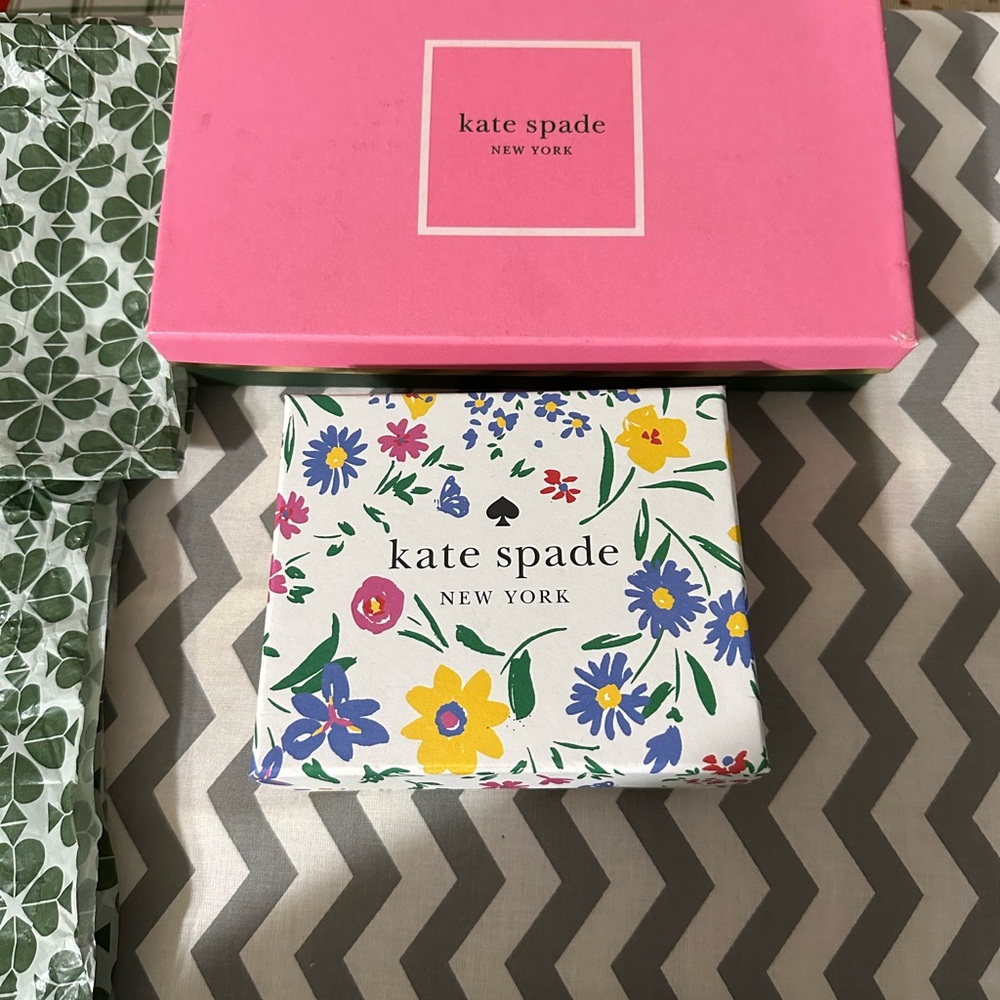 Two. Empty wallet and card size boxes.